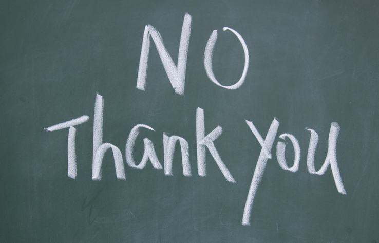 "No thank you" written on a chalkboard